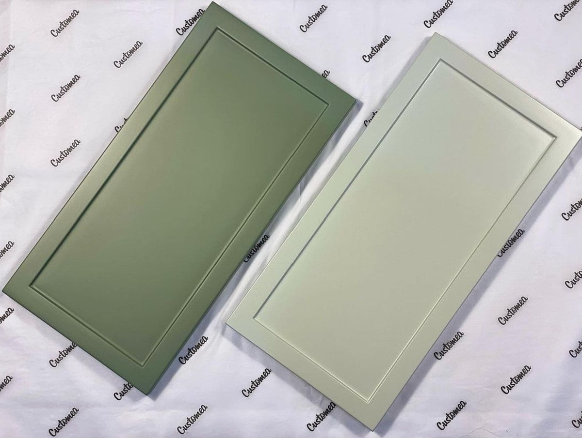 Two painted Shaker sample doors in green tones on Customea tissue paper