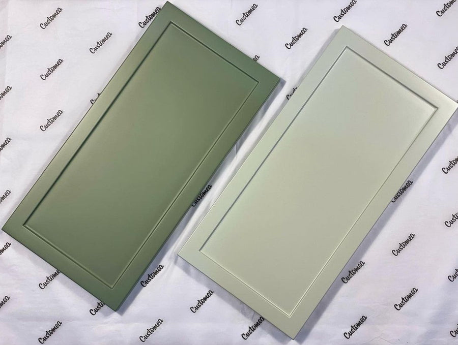 Two painted Shaker sample doors in green tones on Customea tissue paper