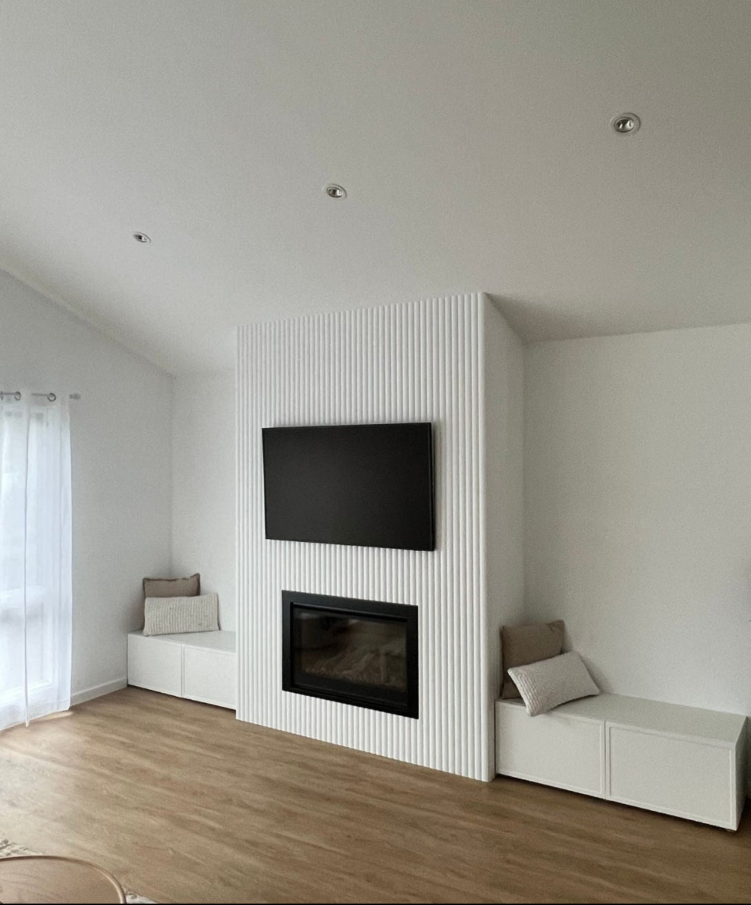 Wall-mounted walnut living room cabinetry